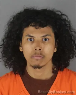 Mugshot of Giovanni Lisandro Suarez booked in Hennepin County, Minnesota on October 12, 2026