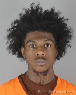 Mugshot of Quentin Tremaine Jr Domino booked in Hennepin County, Minnesota on October 12, 2026