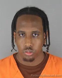 Mugshot of Mahamed Ali Haji booked in Hennepin County, Minnesota on October 13, 2026