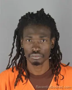 Mugshot of Koffivi Sewa Aklassou booked in Hennepin County, Minnesota on October 13, 2026