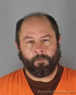 Mugshot of Michael Donald Mortensen booked in Hennepin County, Minnesota on October 13, 2026