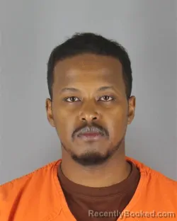 Mugshot of Ahmed Reyse Abas booked in Hennepin County, Minnesota on October 13, 2026
