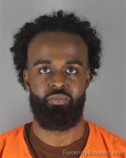 Mugshot of Ayub Ahmed Abdirisaq booked in Hennepin County, Minnesota on October 13, 2026