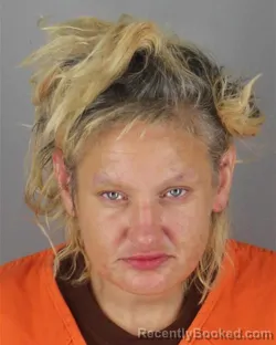 Mugshot of Kelsey Marie Burton booked in Hennepin County, Minnesota on October 13, 2026