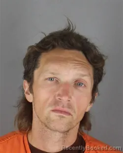 Mugshot of Paul Mark Elliott booked in Hennepin County, Minnesota on October 14, 2026