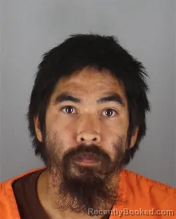 Mugshot of Dominique Vardon Curry booked in Hennepin County, Minnesota on October 14, 2026