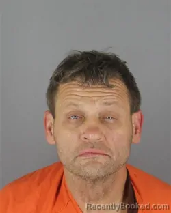 Mugshot of Anthony Michael Bishop booked in Hennepin County, Minnesota on October 14, 2026