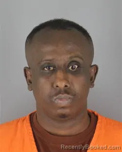 Mugshot of Warsame Jama Warsame booked in Hennepin County, Minnesota on October 14, 2026