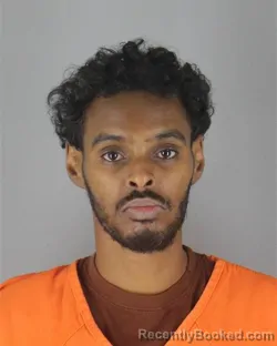 Mugshot of Mohamed Ahmed Hussein booked in Hennepin County, Minnesota on October 14, 2026