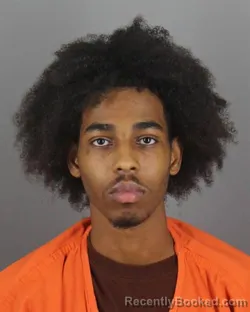 Mugshot of Musab Ibrahim Aden booked in Hennepin County, Minnesota on October 14, 2026