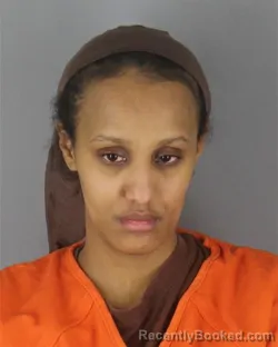 Mugshot of Huda Ali Hassan booked in Hennepin County, Minnesota on October 15, 2026