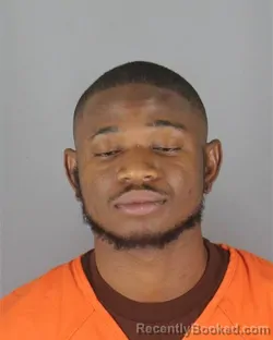 Mugshot of Johnny Baryama Kolako booked in Hennepin County, Minnesota on October 15, 2026