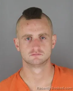Mugshot of Jacob Michael Marciniak booked in Hennepin County, Minnesota on October 15, 2026