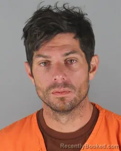 Mugshot of Erik Dean Olson booked in Hennepin County, Minnesota on October 16, 2026