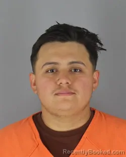 Mugshot of Christian Santivanez Flores booked in Hennepin County, Minnesota on October 16, 2026