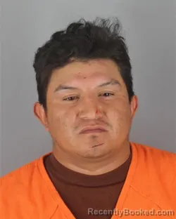 Mugshot of Edison Xavier Masapanta Apugllon booked in Hennepin County, Minnesota on October 17, 2026