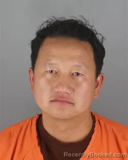 Mugshot of Mong Yang booked in Hennepin County, Minnesota on October 18, 2026