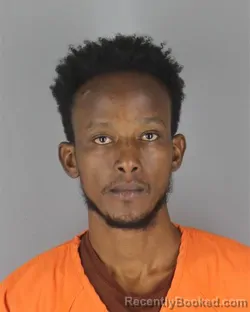 Mugshot of Khadar Abdulle Mohamud booked in Hennepin County, Minnesota on October 18, 2026