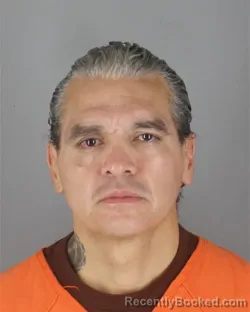 Mugshot of Alberto Herrera booked in Hennepin County, Minnesota on October 19, 2026