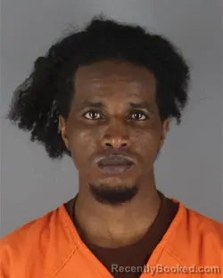 Mugshot of Abdirisak Muktar Omar booked in Hennepin County, Minnesota on October 20, 2026
