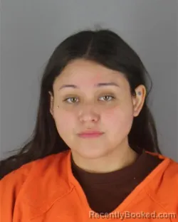Mugshot of Isis Edith Villela Rebolledo booked in Hennepin County, Minnesota on October 21, 2026