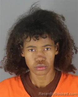 Mugshot of Jasmine Pearl Wilford booked in Hennepin County, Minnesota on October 21, 2026