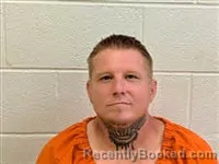 Mugshot of Brandon Scott Ross booked in Rutherford County, North Carolina on October 7, 2026