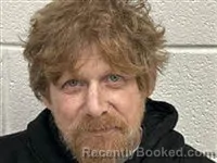 Mugshot of Travis Edward Queen booked in Rutherford County, North Carolina on October 28, 2026