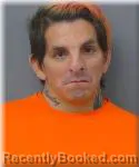 Mugshot of Travis Oxtra booked in Hubbard County, Minnesota on August 13, 2026