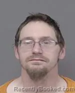 Mugshot of Justin Morgan Belanger booked in Isanti County, Minnesota on March 28, 2026