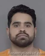 Mugshot of Ivan De La Cruz booked in Isanti County, Minnesota on March 30, 2026