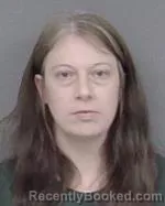 Mugshot of Lisa Marie Rosenau booked in Isanti County, Minnesota on March 31, 2026