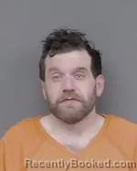 Mugshot of Matthew Thomas Hughes booked in Isanti County, Minnesota on April 2, 2026