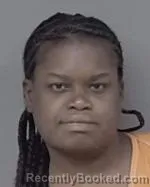 Mugshot of Iesheia Nattaye Brown booked in Isanti County, Minnesota on April 13, 2026