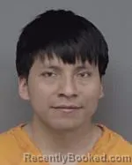Mugshot of Julio Cesar Llugsha Cabrera booked in Isanti County, Minnesota on May 15, 2026