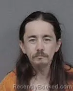 Mugshot of Justin James Smolak booked in Isanti County, Minnesota on May 15, 2026