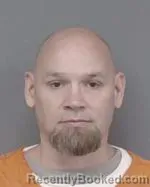 Mugshot of Joseph Daniel Madigan booked in Isanti County, Minnesota on July 13, 2026