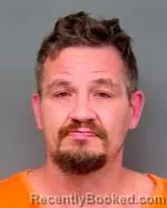 Mugshot of Chad Allan Mitchell booked in Isanti County, Minnesota on October 1, 2026