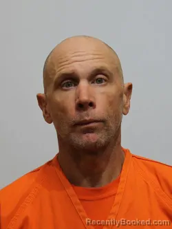 Mugshot of JUSTIN DRISCOLL