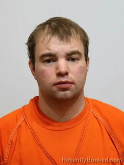Mugshot of AARON HUEBSCHER