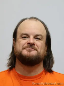 Mugshot of MICHEAL OLSON booked in Itasca County, Minnesota on April 13, 2026