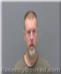 Mugshot of Michael Olin booked in Kanabec County, Minnesota on May 10, 2026