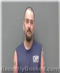 Mugshot of Brett Rasmussen booked in Kanabec County, Minnesota on June 11, 2026