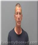 Mugshot of Keith Rothbauer booked in Kanabec County, Minnesota on October 8, 2026