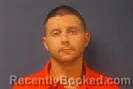 Mugshot of Travis Robert Trusdell booked in Sampson County, North Carolina on July 15, 2026