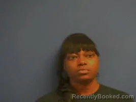 Mugshot of Justina Moniqque Henry booked in Sampson County, North Carolina on October 15, 2026