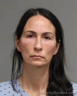 Mugshot of Angela Marie Lea Lange booked in Martin County, Minnesota on October 4, 2026