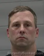 Mugshot of Dustin Mark Theuringer booked in McLeod County, Minnesota on March 27, 2026