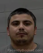 Mugshot of Alfonso Cruz booked in McLeod County, Minnesota on October 18, 2026