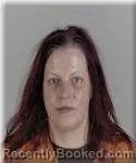 Mugshot of Amy Mohs booked in Mille Lacs County, Minnesota on August 13, 2026